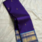 Handwoven purple Kancheepuram silk saree — antique-gold zari butta detail