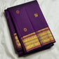 Handwoven purple Kanjeevaram saree – meenakari butta closeup showing intricate zari motifs