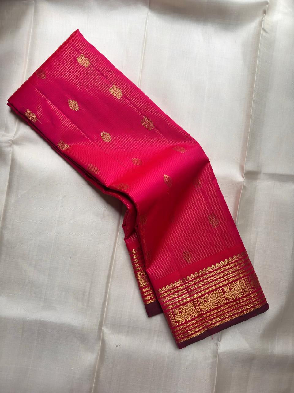Raspberry pink handwoven KanchiPattu silk saree — full saree showing handwoven silk texture