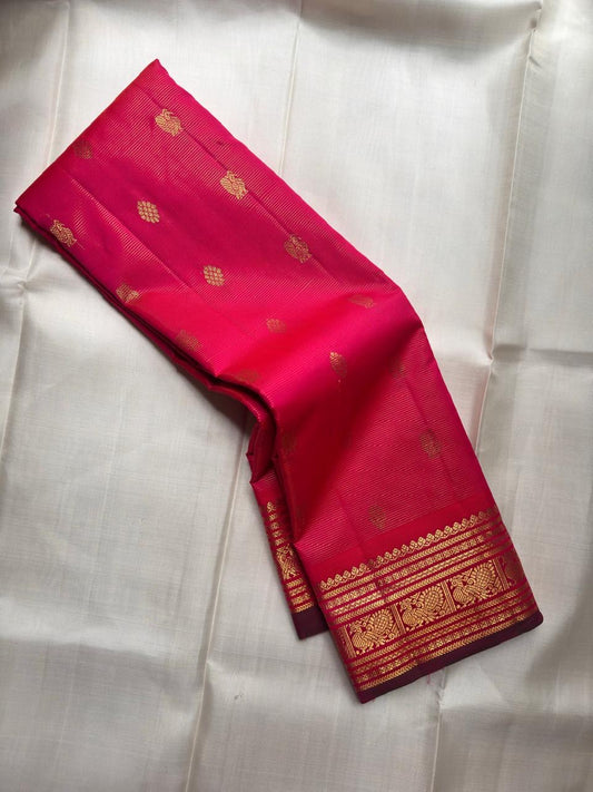 Raspberry pink handwoven KanchiPattu silk saree — full saree showing handwoven silk texture