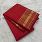 Stacked folded red vairaoosi Kanchipattu saree with gold zari varisaipet border Idam Living