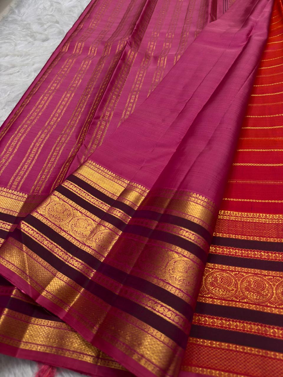 Varisaipet silk saree with ornate traditional gold zari border.