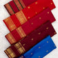 Handwoven Rettapet border detail on the deep raspberry pink Kanjipuram silk saree