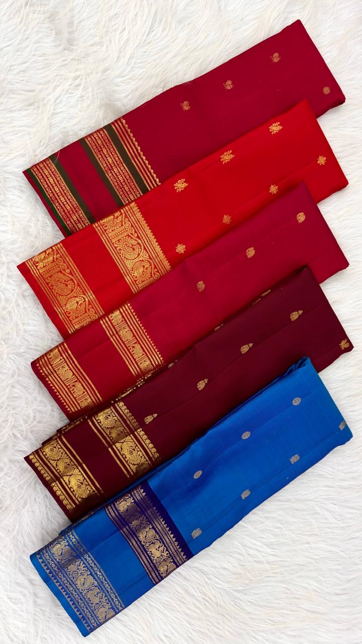 Handwoven Rettapet border detail on the deep raspberry pink Kanjipuram silk saree