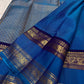 Handwoven Rettapet saree in royal azure blue with purple border, draped view
