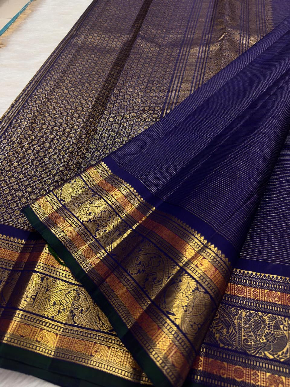 Royal Indigo Violet Handwoven Pure Silk Kanchipuram Vairaoosi Saree with Gold Zari Buttas and Traditional Zari Border