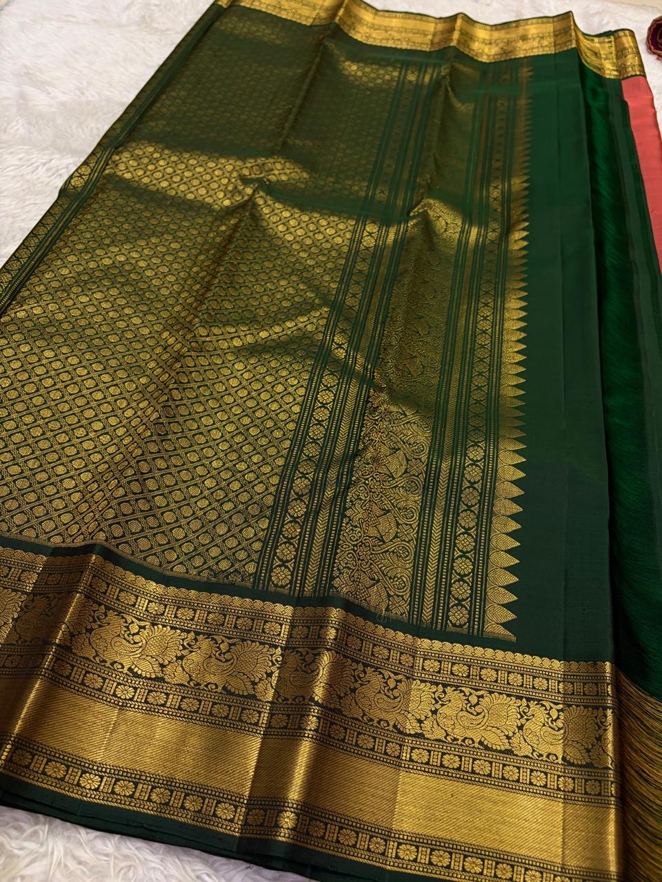 Handwoven rust orange silk saree with gold zari korvai border