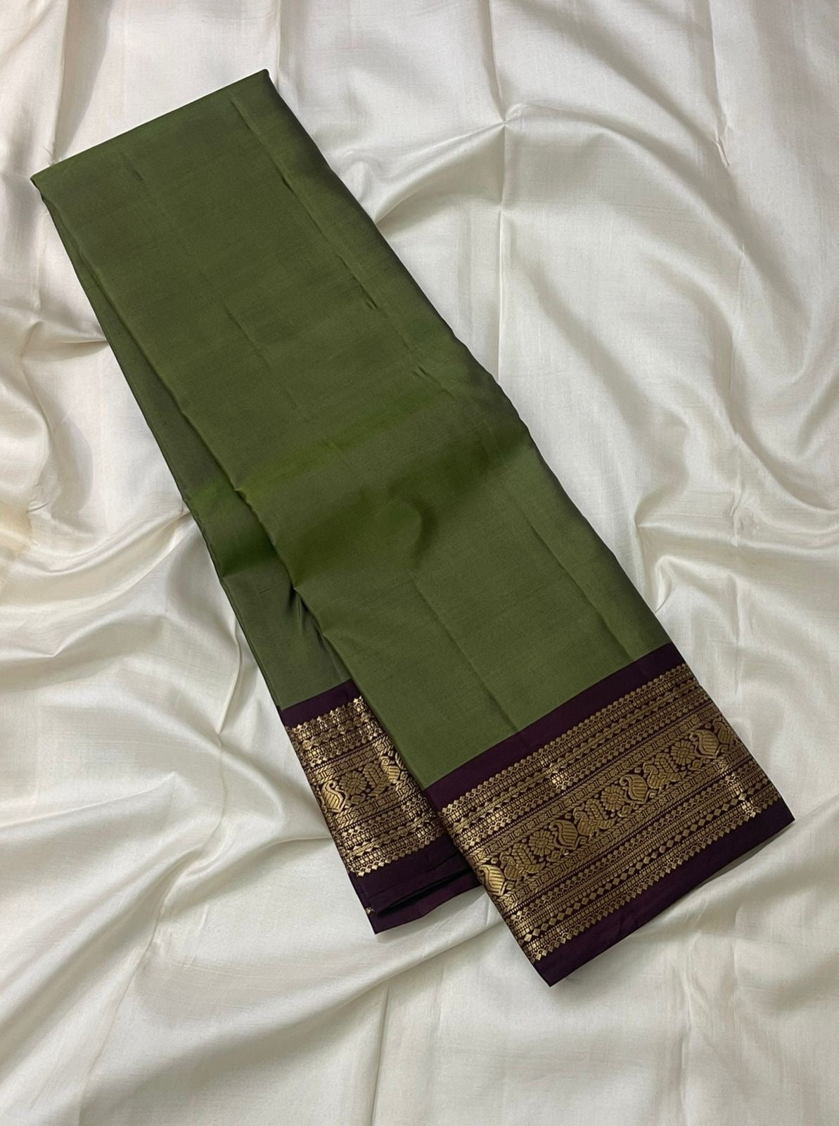 Sage green lightweight pure silk Kanchipuram saree with deep plum varisaipet border handwoven in Kanchipuram — Idam Living