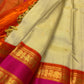 Full textile view of Chandanam Pure Silk Kanchipuram saree with maanga buttas and layered Rettapet border.