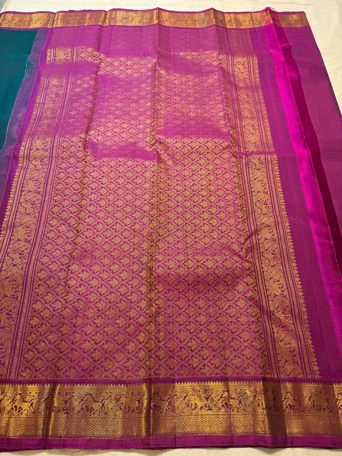 Handwoven Deep Teal Pure Silk Kanchipuram.