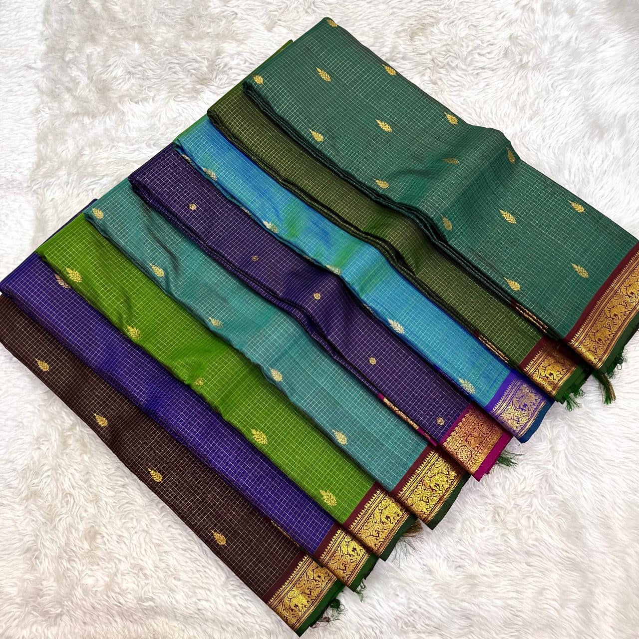 Handwoven teal silk saree with antique gold woven kattam checks