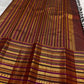 Handwoven Varisaipet border detail on the deep cocoa maroon Kanjivaram silk saree