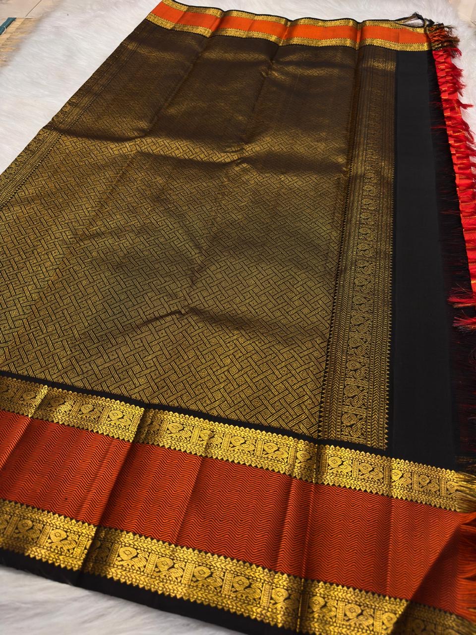 Vermilion Orange Handwoven Pure Silk KanchiPattu Saree with Rettapet Lines and Rust Manthulir Border