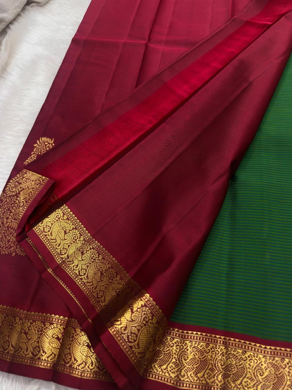 Peacock Green Vairaoosi Stripes Lightweight Pure Silk Kanchipuram Saree with Arakku Peacock Border – zari border motif detail