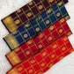 Handwoven Zari Kattam saree in vermilion orange with Mayil Chakram motifs, styled view