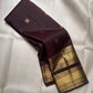Rettapet border detail on Aubergine Kanjivaram silk saree with contrasting green