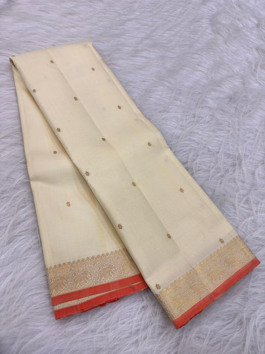 Ivory Handwoven Pure Silk Kanjivaram Saree with Small Gold Buttas & Petite Zari Elephant Border