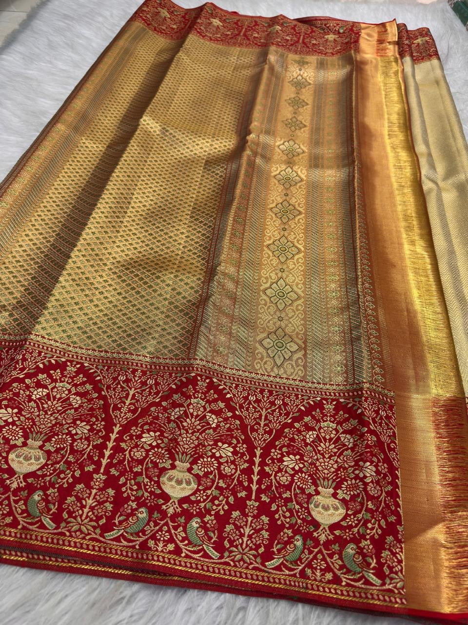 Sandalwood ivory handwoven pure silk Banarasi-Kanchipuram fusion saree with champagne-gold zari and vermilion-red floral urn and bird border