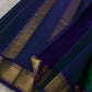 Emerald Green and Neelam Violet-Blue lightweight Kanchipuram silk saree, geometric gold zari border and patterned violet-blue pallu; pallu detail