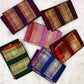 Folded deep maroon Rettapet Kanjipuram silk saree with vermilion selvedge