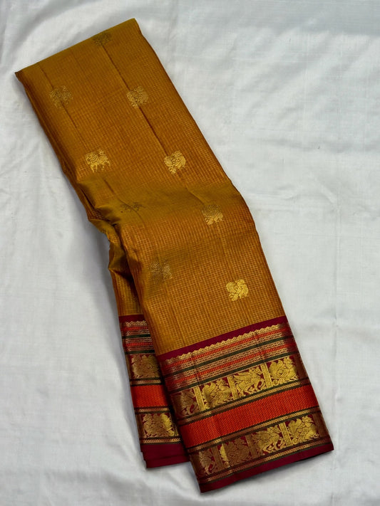 Pure silk Kanchipuram saree in Honey Brown with Arakku Red, traditional handwoven border and zari detail