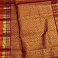 Honey Brown Zari Kattam saree with alternating Mayil and Yazhi gold motifs and layered Arakku Red border