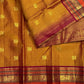 Handwoven Kanchipuram Zari Kattam saree in Honey Brown with Arakku Red with distinctive traditional silk colouring