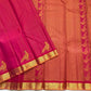 Close view of hot pink KanchiPattu silk body with fine Vairaoosi zari lines running horizontally across the field