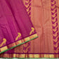 Detail of fine Vairaoosi zari lines woven continuously across hot pink Kanjipuram pure silk body