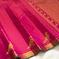 Handwoven hot pink Kanchipuram pure silk saree with fine Vairaoosi zari shimmer body and contrast forest green border