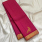 Copper gold zari border of hot pink KanchiPattu pure silk saree with classical temple motif frieze