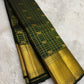 Close view of Zari Kattam body showing Gandaberunda Butta on hunter green Kanjivaram silk
