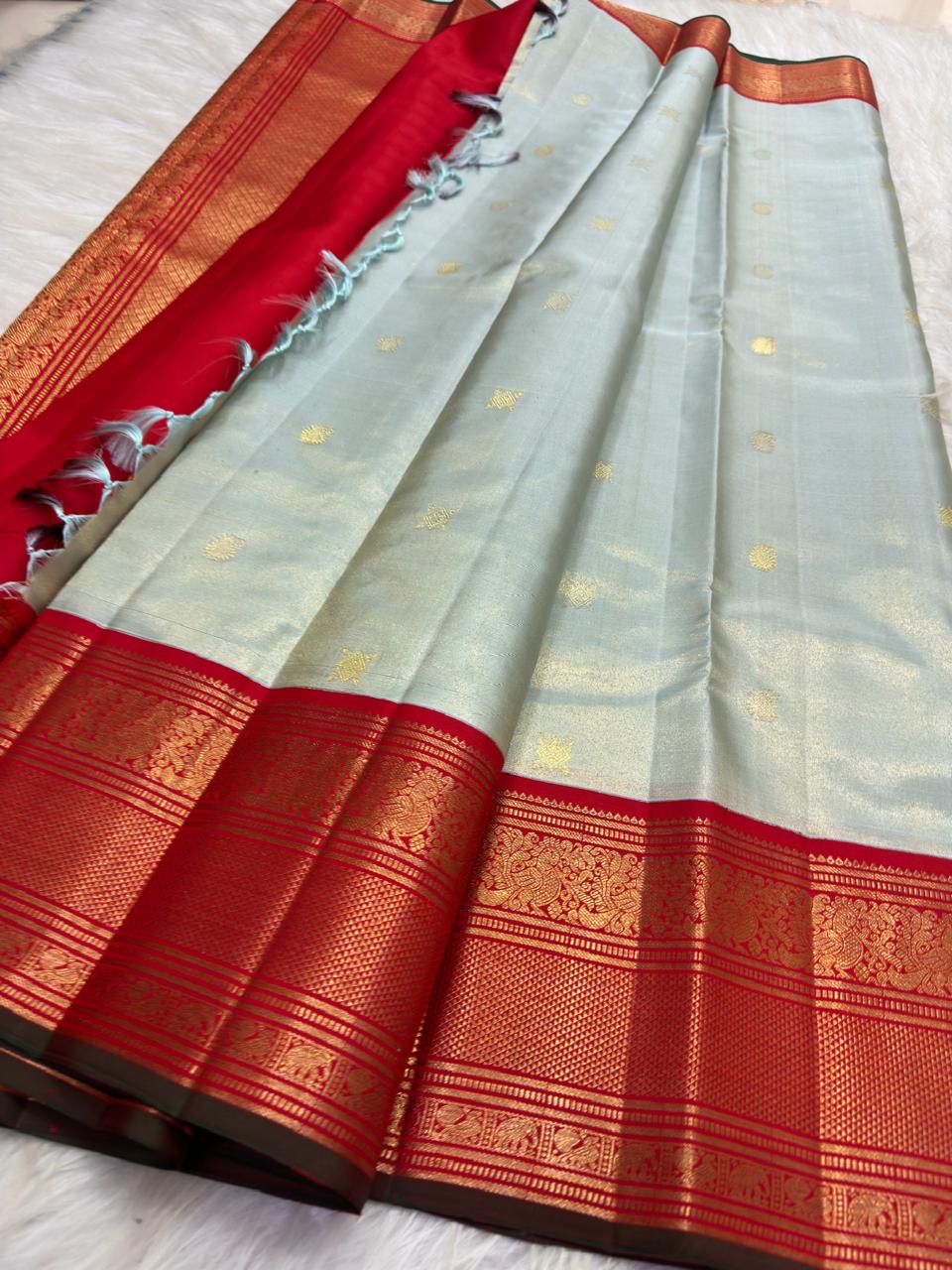 Ice blue pure silk Kanjeevaram Korvai saree with gold zari