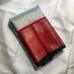 Ice blue tissue Kanchipuram silk saree with Korvai red zari border