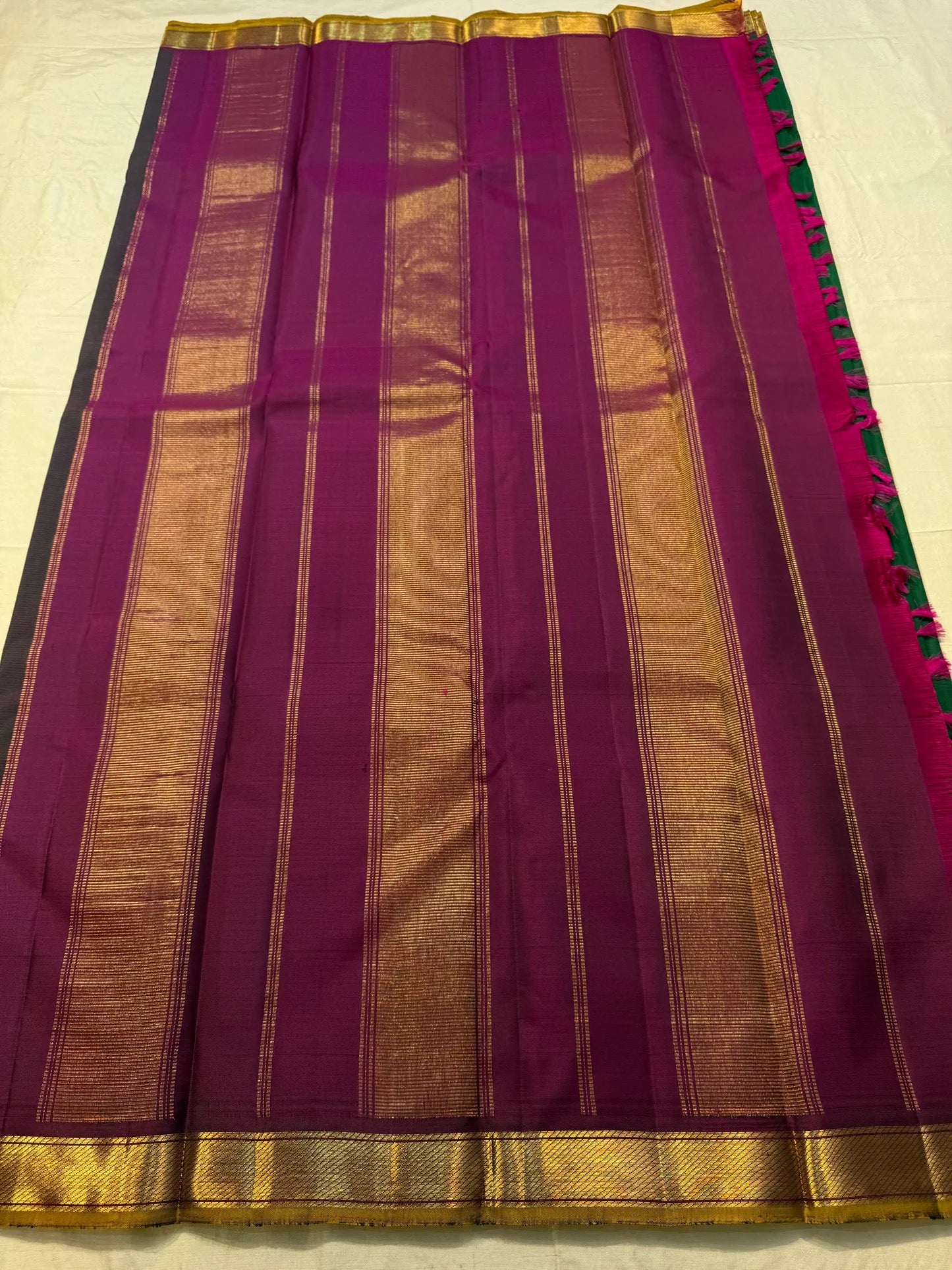Antique gold zari border on emerald Kancheevaram silk saree – Idam Living
