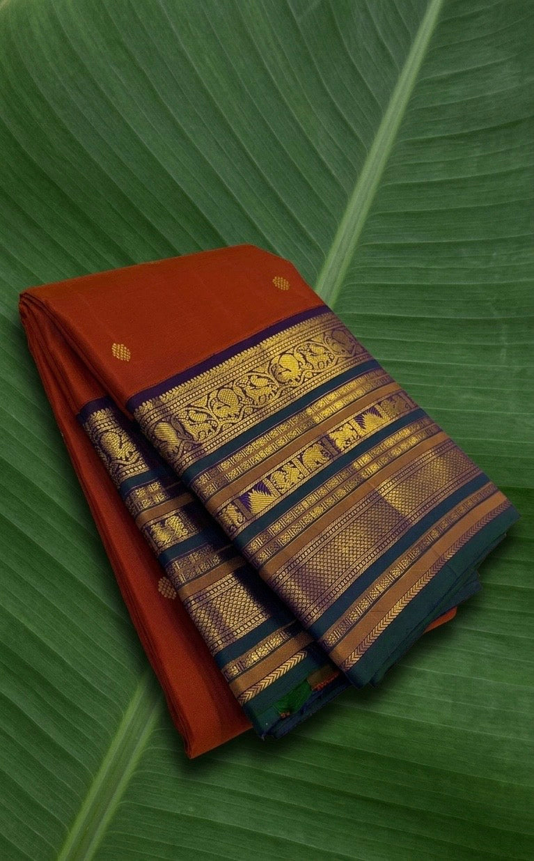 Burnt Rust and Violet Handwoven Pure Silk Kanchipuram Saree with Traditional Yaanai Korvai Border
