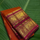 Burnt Terracotta and Jamun Purple Handwoven Pure Silk Kanchipuram Saree with Sorgavaasal Yaanai Korvai Border