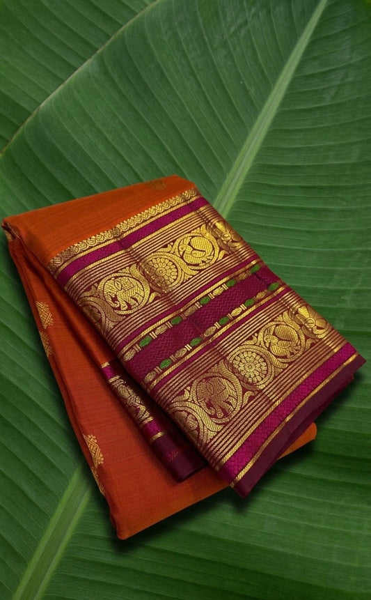 Burnt Terracotta and Jamun Purple Handwoven Pure Silk Kanchipuram Saree with Sorgavaasal Yaanai Korvai Border