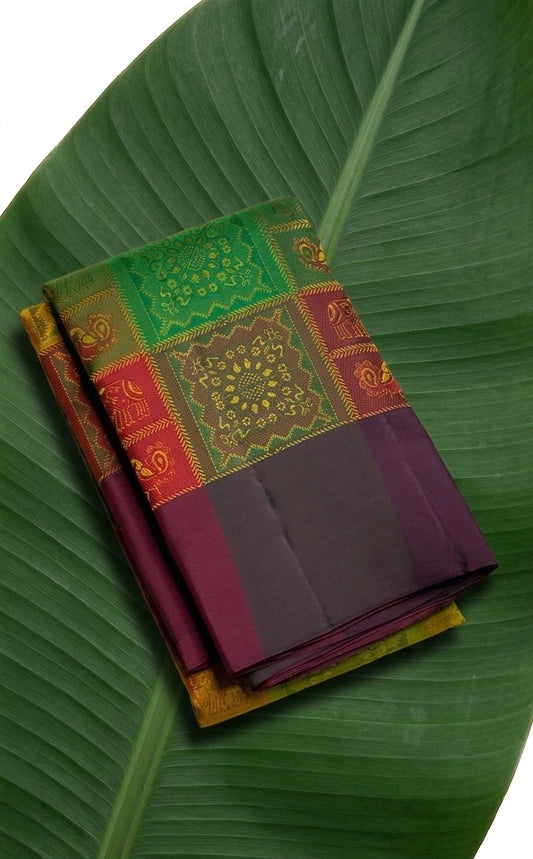 Forest green Kanchipuram pure silk saree with Bomkai inspired motif panels and mulberry plum border Idam Living