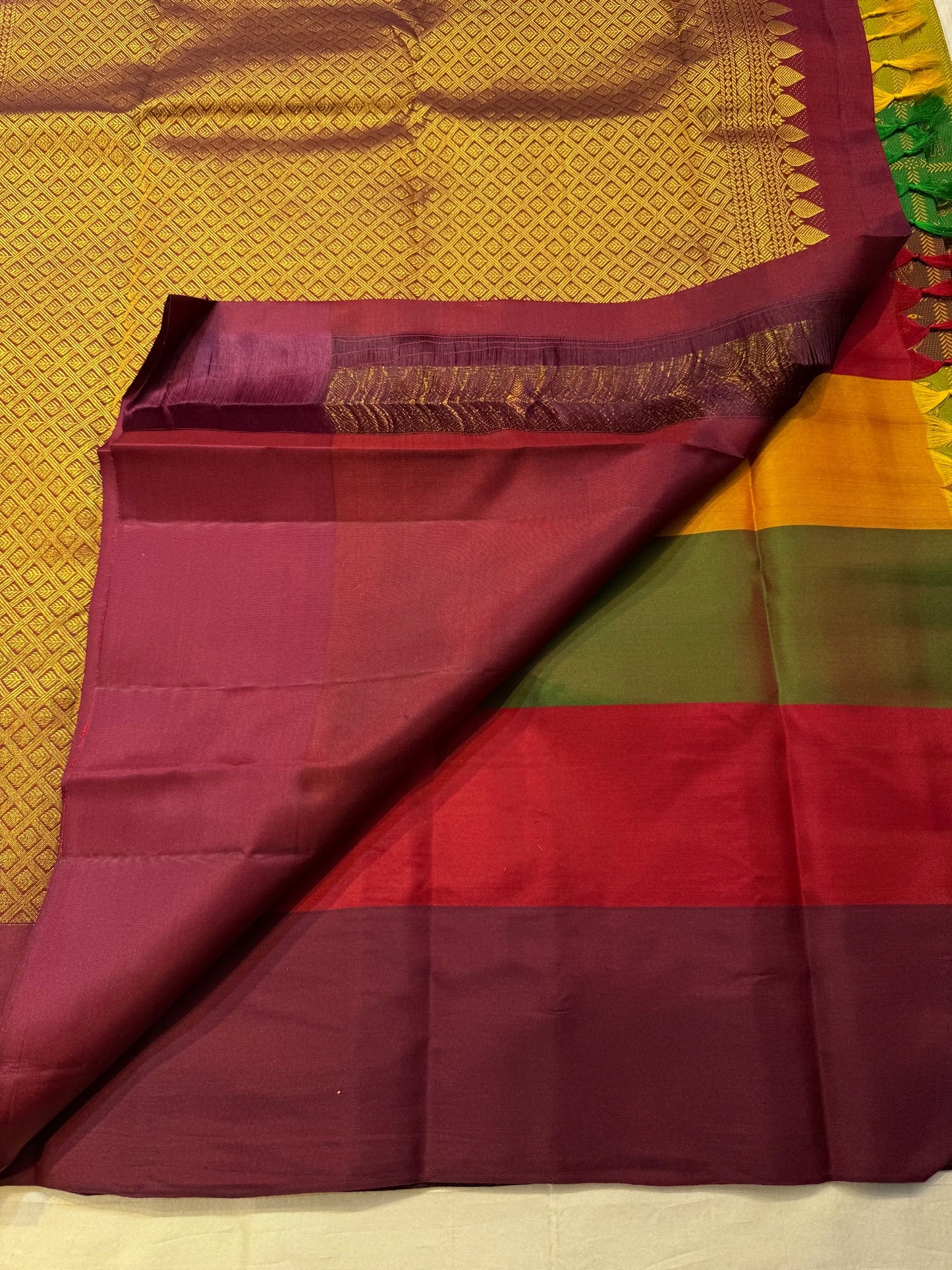 Forest green Kancheevaram pure silk saree with traditional zari and Bomkai inspired panels Idam Living