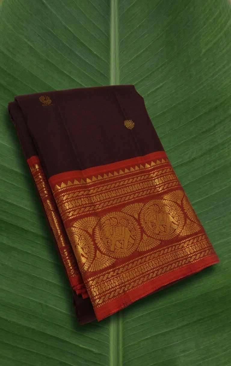 Paaku Brown and Vermillion Red Handwoven Pure Silk Kanchipuram Saree with Sorgavaasal Yaanai Korvai Border