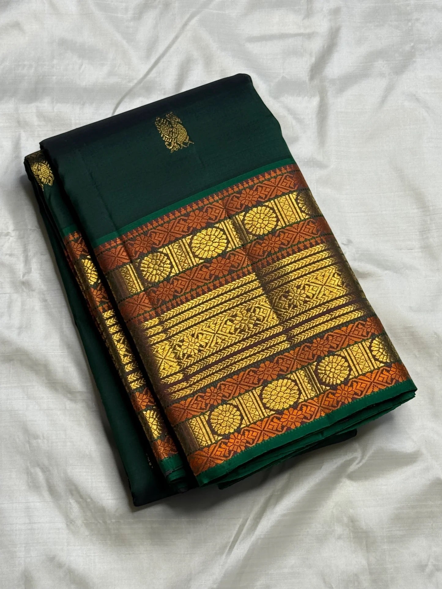 Deep Bottle Green and Amber Kanchipuram Silk Saree – Ornate Pallu View
