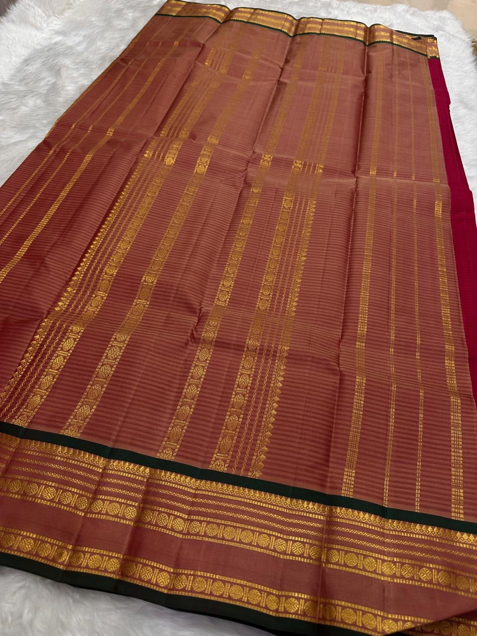 Deep Red and Black Handwoven Pure Silk Kanchipuram Saree with Gold Zari Band Border.