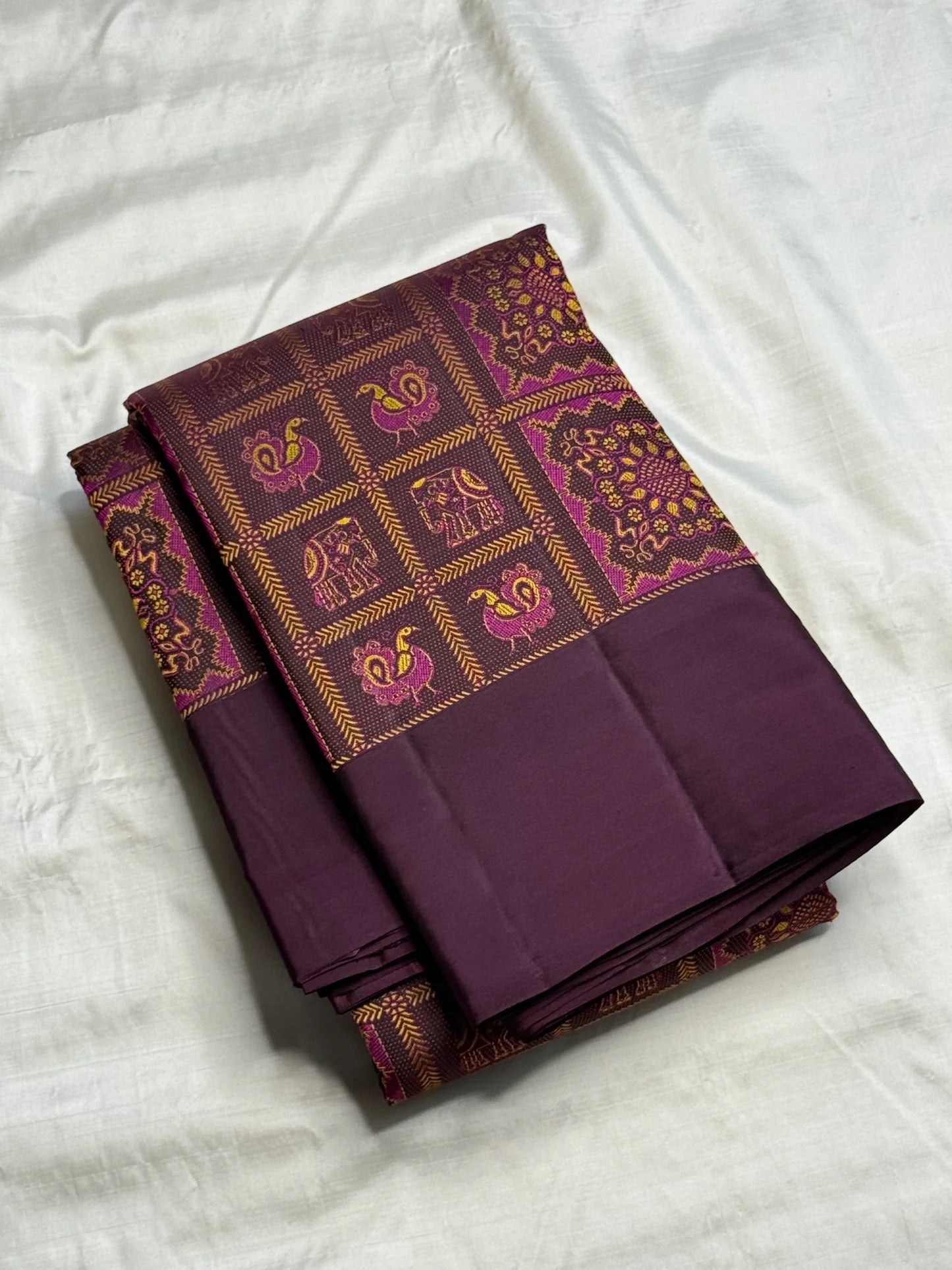 Elephant and peacock woven panel on chocolate brown Kanchipattu silk saree Idam Living