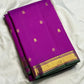 Pure Kanchipattu silk saree in royal orchid purple with ornamental floral motifs and traditional zari craftsmanship