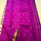Pure Kancheepuram silk saree featuring delicate floral buttas, traditional zari border, and elegant seer pallu