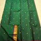 Floral butta motifs on deep green Kanchipattu pure silk saree – Idam Living