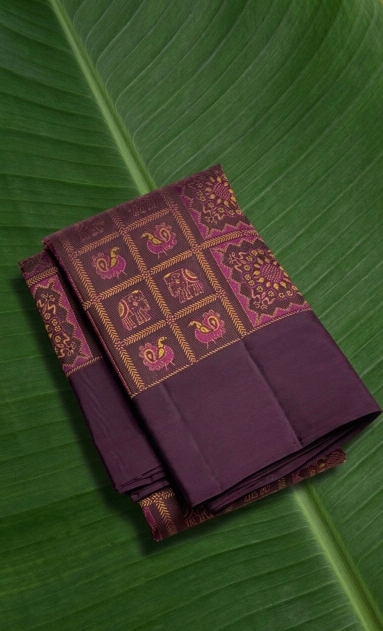 Deep chocolate brown Kanchipuram pure silk saree with Bomkai inspired motif panels and magenta accents Idam Living