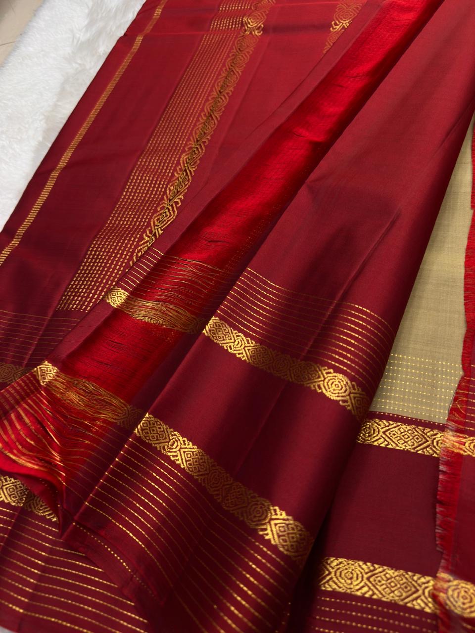 Gold Beige and Maroon Handwoven Pure Silk Kanchipuram Saree with Zari Stripe Border.