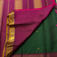 Handwoven emerald green Kanjivaram silk saree with traditional zari border – Idam Living